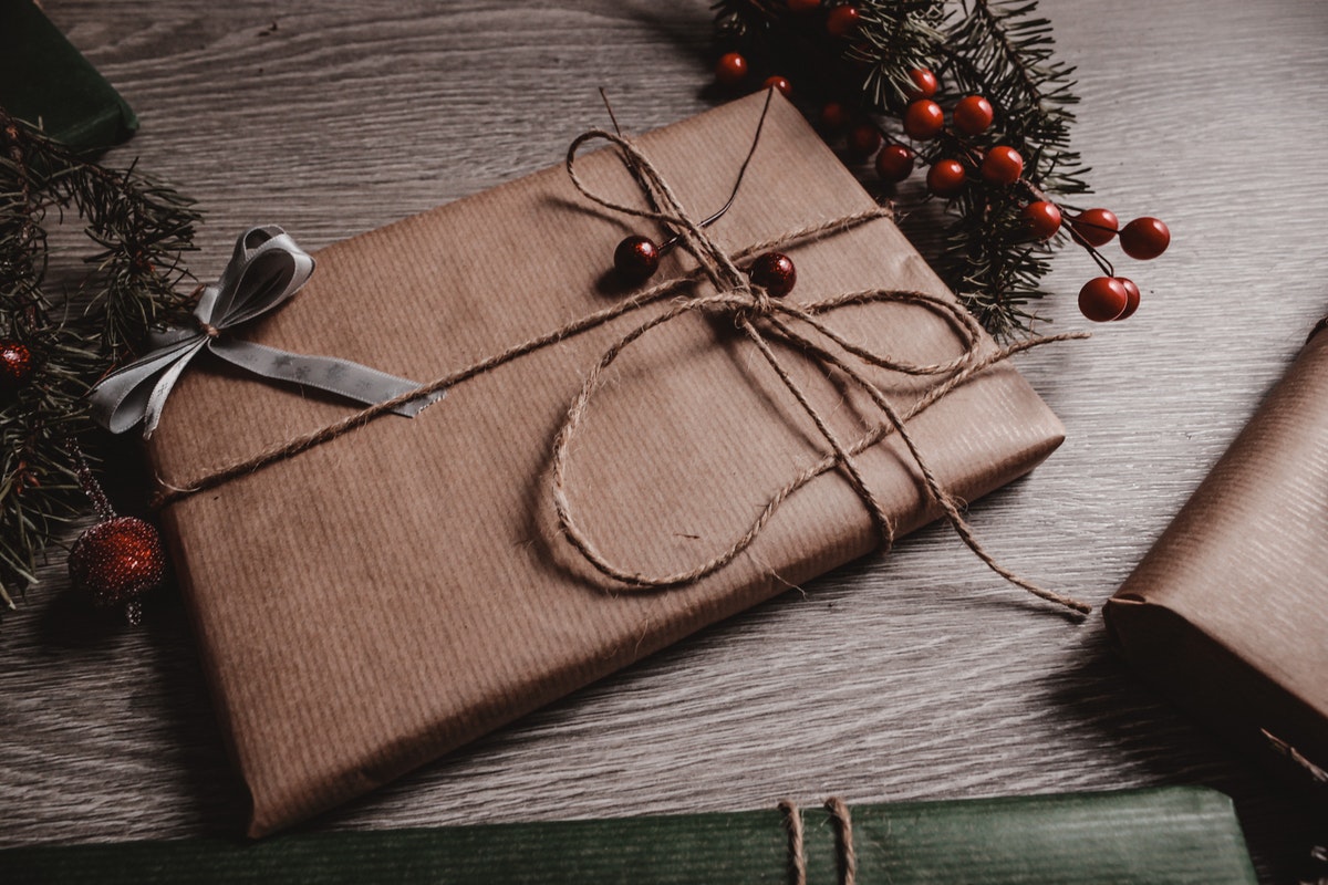 A gift wrapped in brown paper