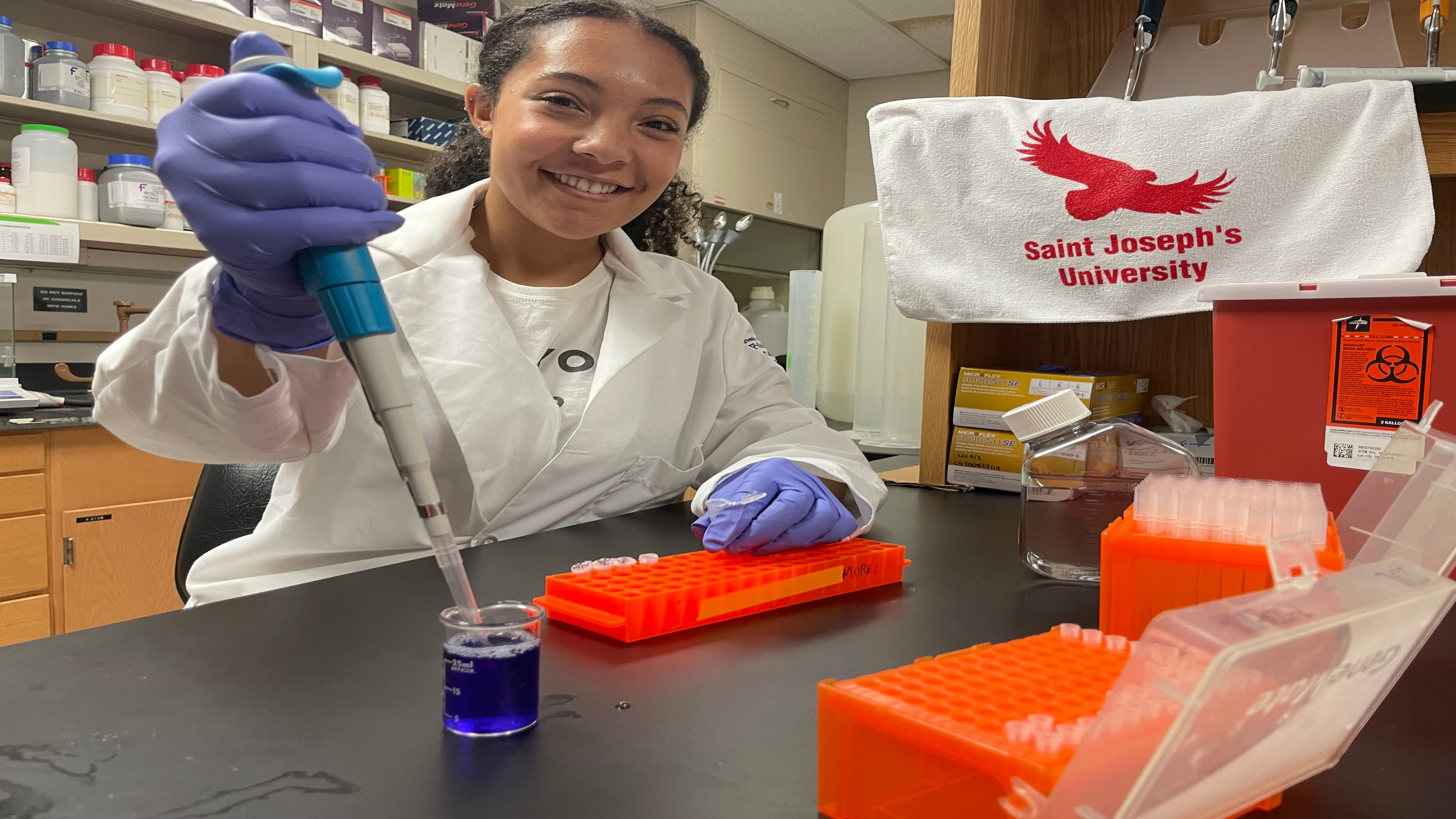 A student conducts an experiment. 