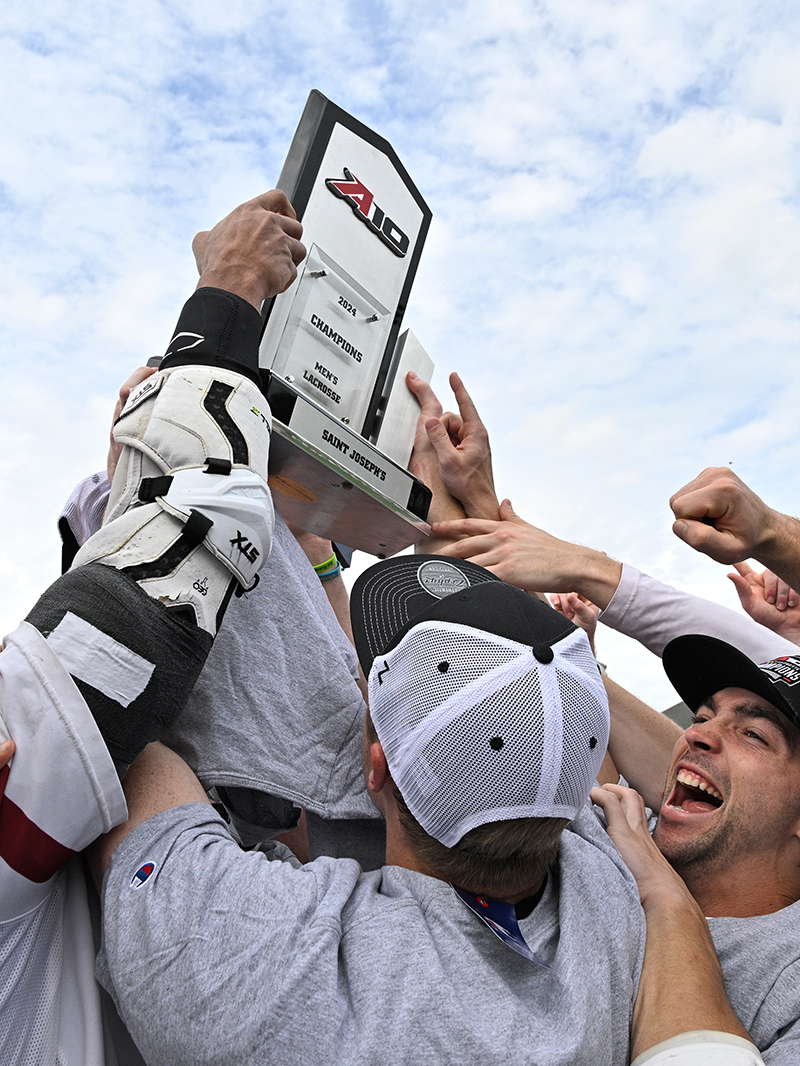 Saint Joseph's Lacrosse team holding championship title