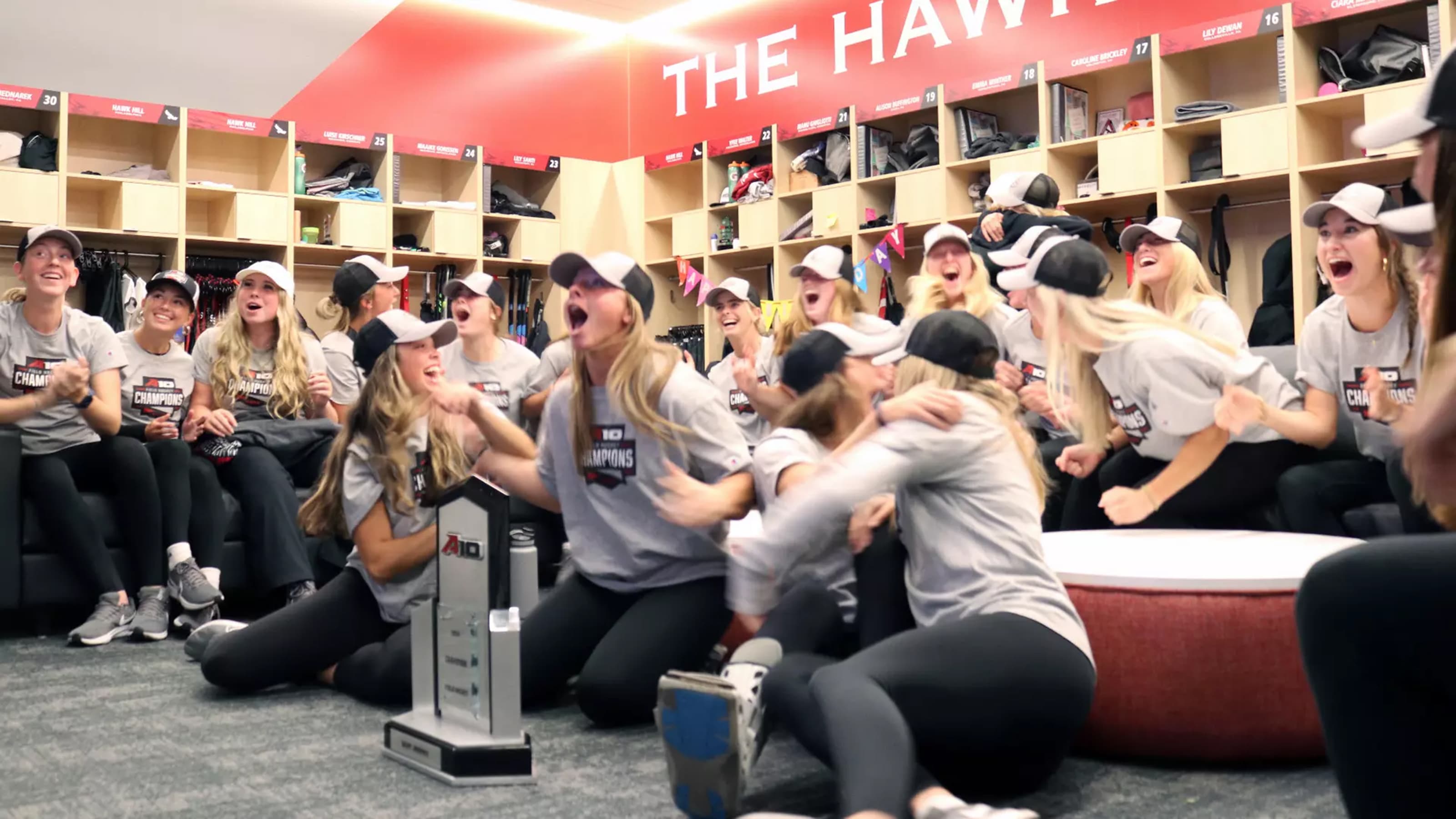 Saint Joseph's field hockey team celebrating championship in locker room