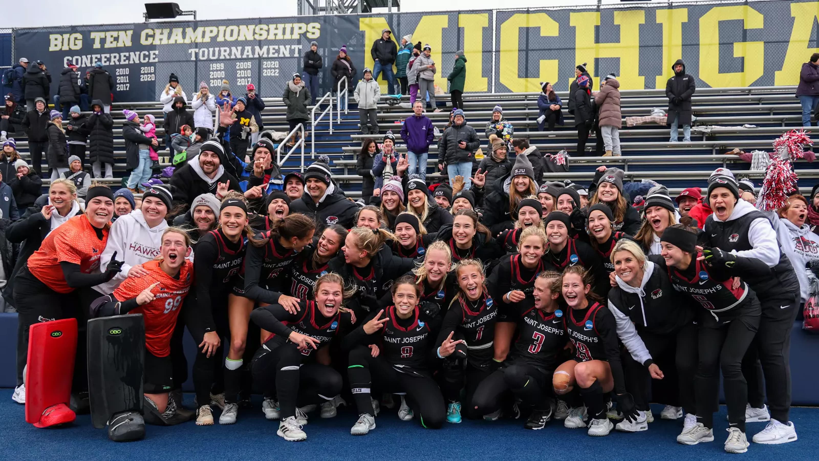 Saint Joseph's field hockey team in group photo after championship game