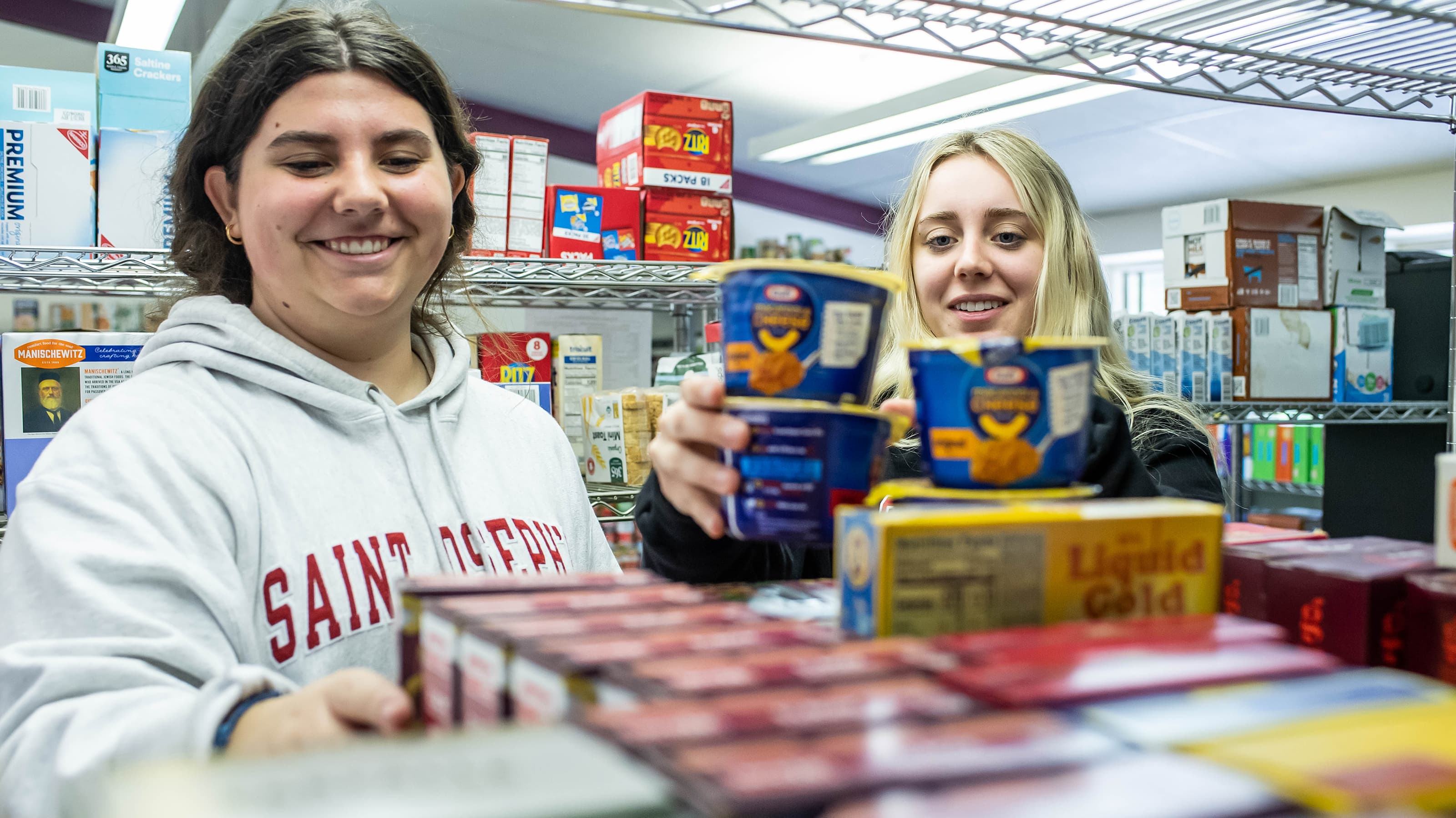 two girls in food pantry at Saint Joseph's University