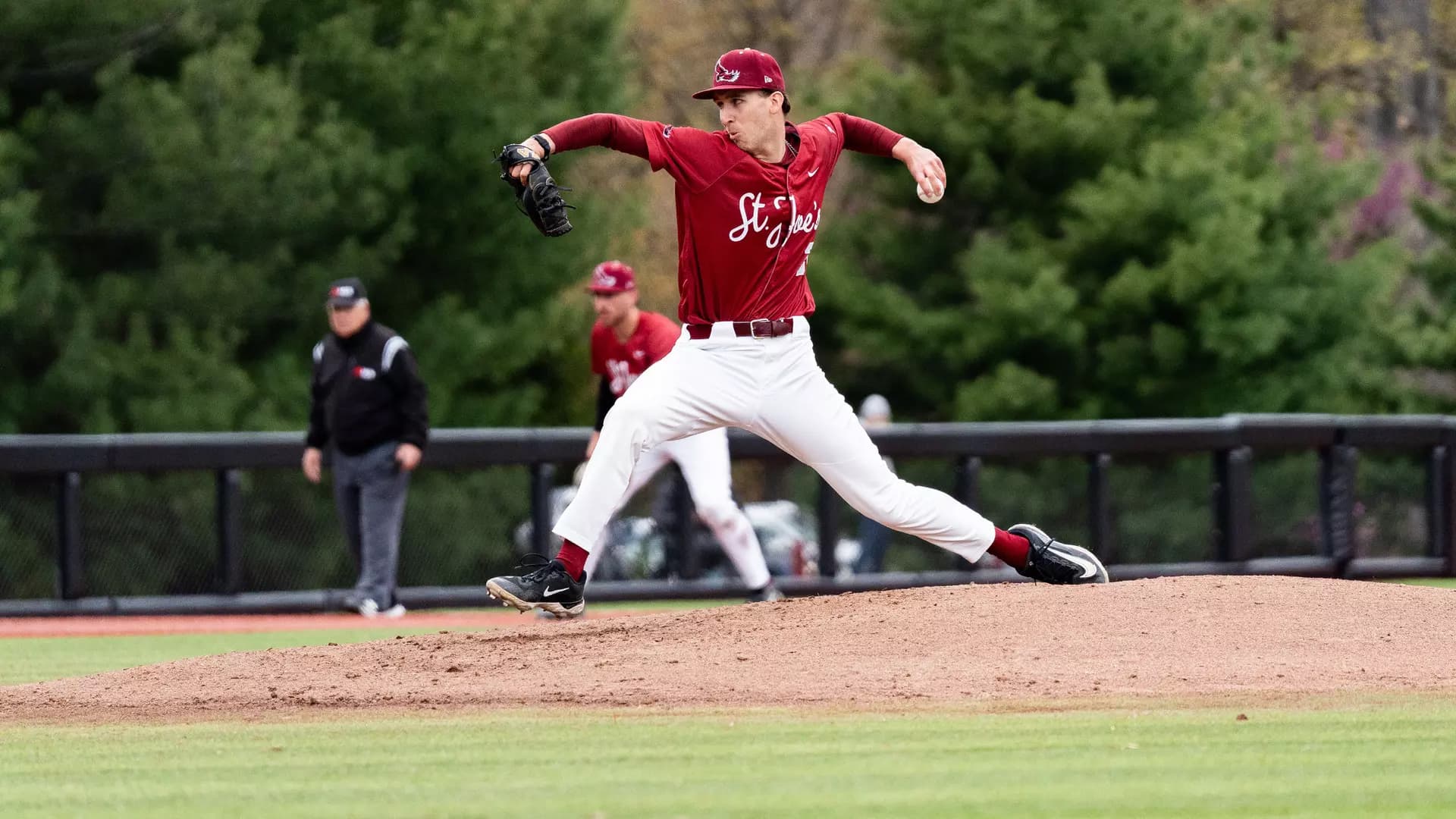 Saint Joseph's Colton Book on the field throwing the baseball