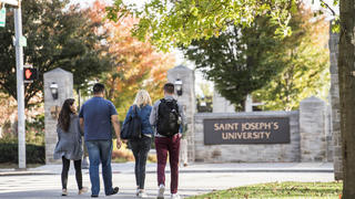Students walking on Saint Joseph's University campus