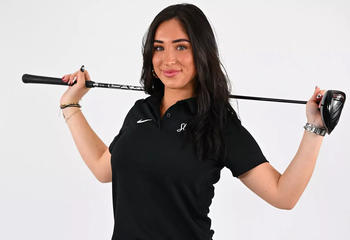 Saint Joseph's Golf player Elora Walker wearing black shirt holding golf stick