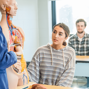 Student in health studies classroom