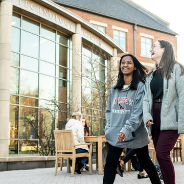 Saint Joseph's University students walking by IPEX on University Campus