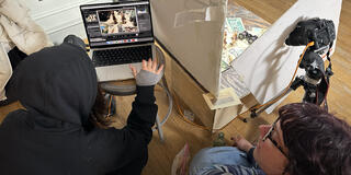 Commercial photography students shooting in studio