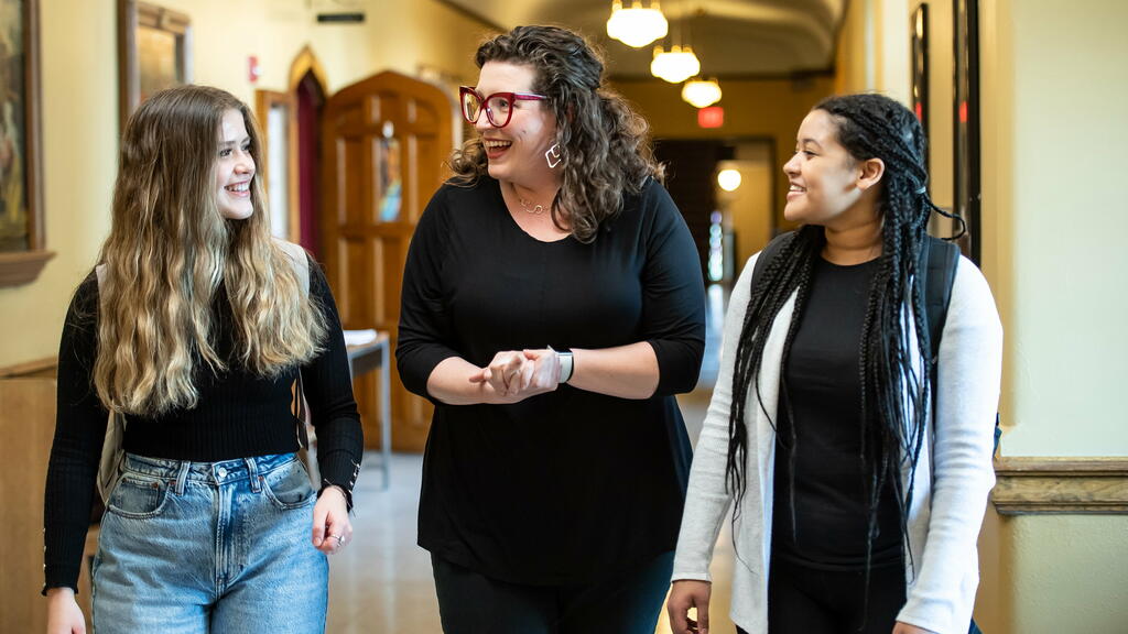 Saint Joseph's University co-op students walking down a hallway in Barbelin Hall