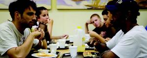 A group of people at a table together.